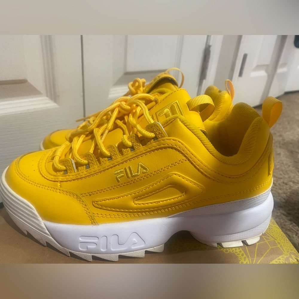 Fila yellow women’s disruptor sneaker